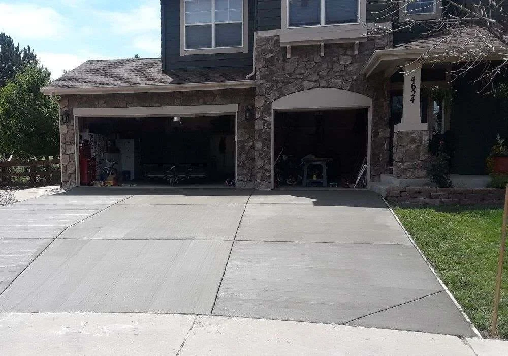 3-car-new-concrete-driveway-with-sidewalk-to-back-of-house-1